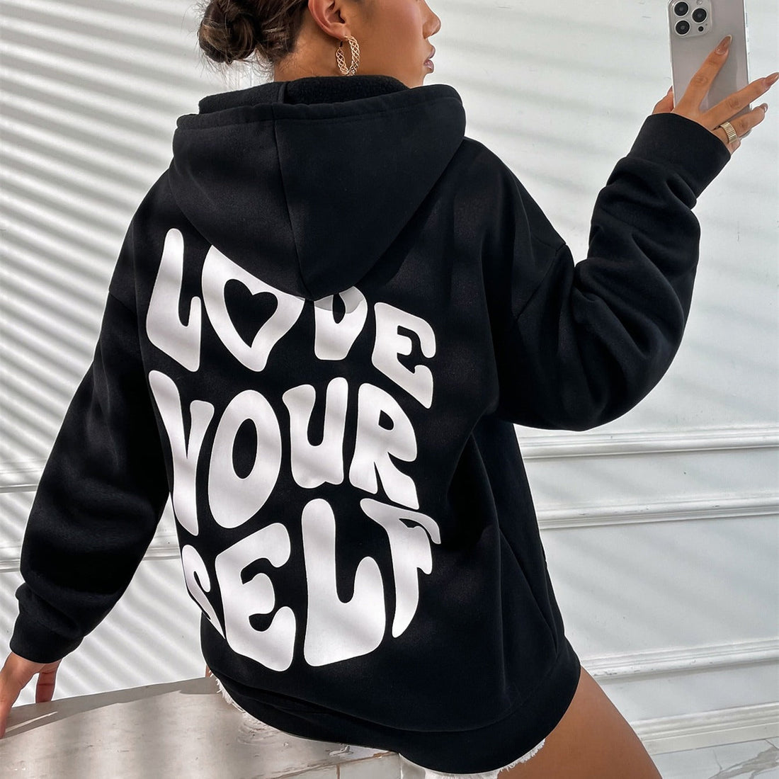 Daria - Sudadera con capucha de algodón estampada