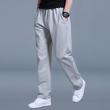Warner - Pantalón de chándal suelto y cómodo para hombres