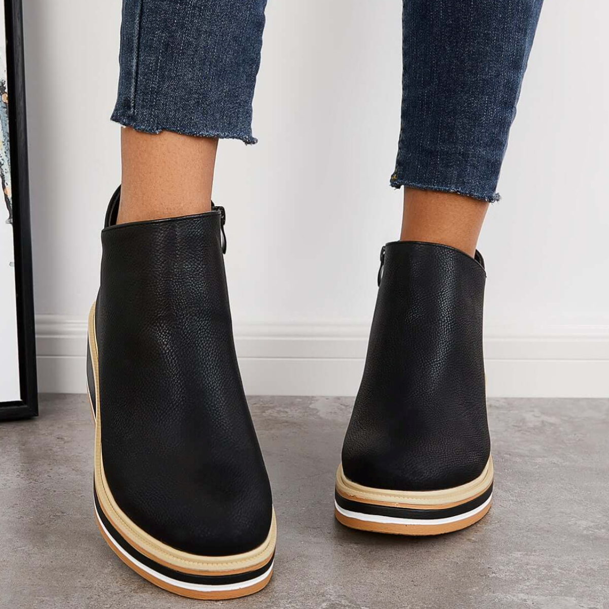 Mari Stella - Botas de cuero con líneas elegantes