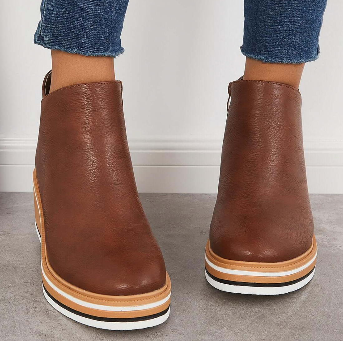 Mari Stella - Botas de cuero con líneas elegantes